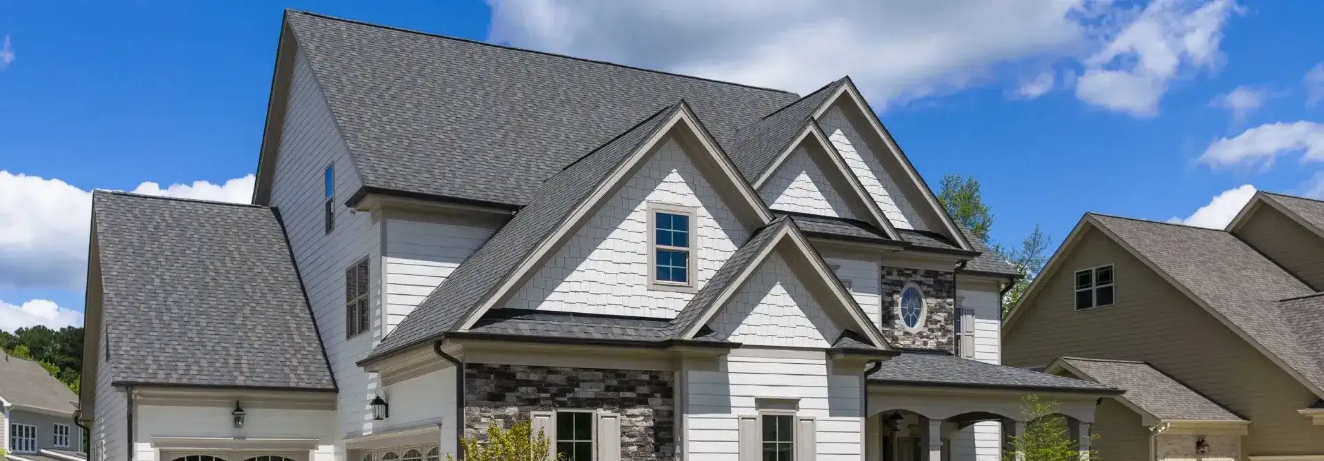 Home with a new asphalt shingle roof
